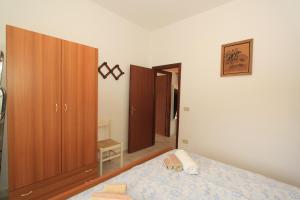 A bed or beds in a room at Borso D'Este 4
