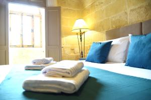 Letto o letti in una camera di Gawhra B&B