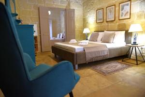Letto o letti in una camera di Gawhra B&B