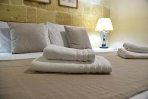 Letto o letti in una camera di Gawhra B&B