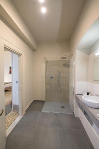 Kúpeľňa v ubytovaní Palazzo Sertorio Suites