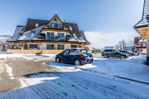 ApartHost Apartament Wyjątkowe Kościelisko v zime