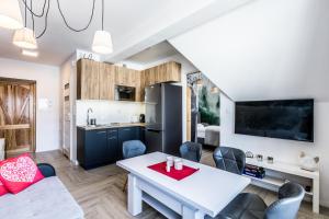 Kuchyňa alebo kuchynka v ubytovaní ApartHost Apartament Wyjątkowe Kościelisko