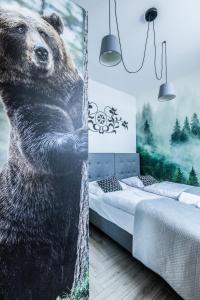 Posteľ alebo postele v izbe v ubytovaní ApartHost Apartament Wyjątkowe Kościelisko