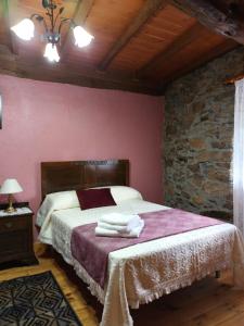Tempat tidur dalam kamar di Casa Romina I