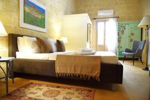 Letto o letti in una camera di Gawhra B&B