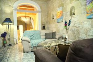 Area soggiorno di Gawhra B&B