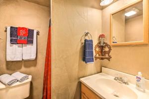 a bathroom with a sink and a mirror at Renovated Bunkhouse on 12-Acre Horse Farm! in Perrysville +31 photos