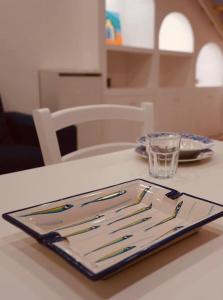 a plate sitting on top of a table at Zaras in Ischia