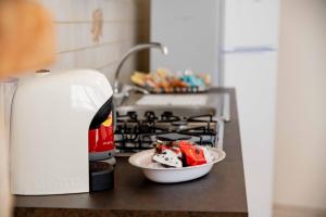 A kitchen or kitchenette at B&B Il Nido sui Trulli