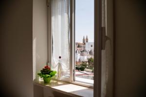 A balcony or terrace at B&B Il Nido sui Trulli