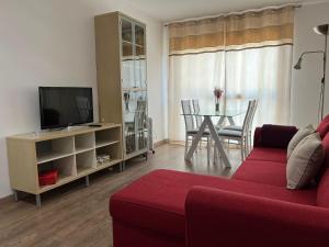 Et tv og/eller underholdning på Apartamento El Jardín