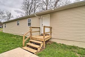 a set of stairs in front of a house at Cozy West Plains Home Near Shopping and Dining! in West Plains