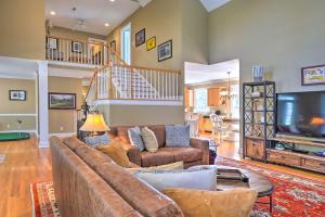a living room with a couch and a tv at Golfers Dream Near Clubhouse of PCC No 6! in Pinehurst