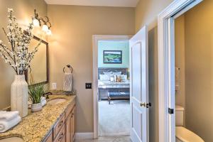 a bathroom with a sink and a mirror at Golfers Dream Near Clubhouse of PCC No 6! in Pinehurst +33 photos