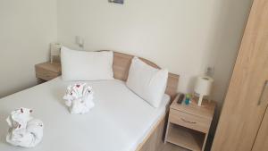 Postel nebo postele na pokoji v ubytování Casa Nicholas