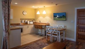 Kuchyň nebo kuchyňský kout v ubytování Causeway Lodge