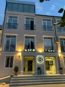a building with a sign that reads usonian spa at Hotel Sani Kutaisi in Kutaisi