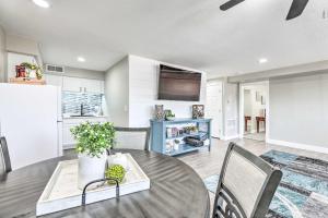 a kitchen and dining room with a table and chairs at Gilbert Apartment with Grill, Fire Pit and Pool Access in Gilbert