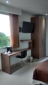 Μια τηλεόραση ή/και κέντρο ψυχαγωγίας στο Hausen Hotel - Suites