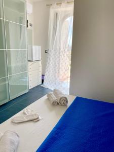 Postel nebo postele na pokoji v ubytování Sperlonga Paradise Suites 500m dal mare in estate Servizio navetta per Sperlonga centro + 37 fotografií