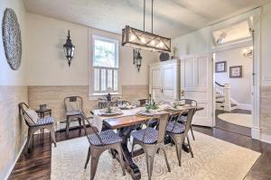a dining room with a table and chairs at Lush, Modern Farmhouse with Mtn Views and Sunroom in Edinburg