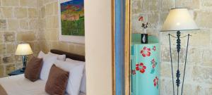 Letto o letti in una camera di Gawhra B&B