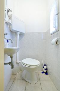 Koupelna v ubytování Apartment City Center Dragica
