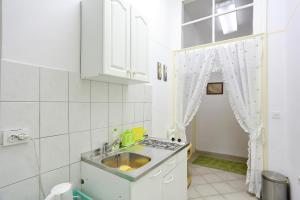Koupelna v ubytování Apartment City Center Dragica