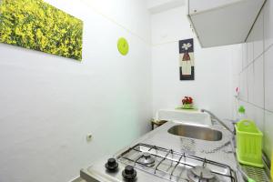 Kuchyň nebo kuchyňský kout v ubytování Apartment City Center Dragica