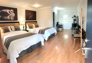 Postelja oz. postelje v sobi nastanitve Duncan Motel