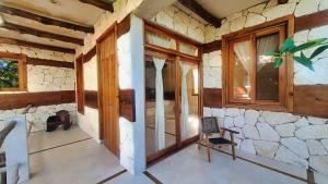 Posezení v ubytování La Casa de Mia Holbox