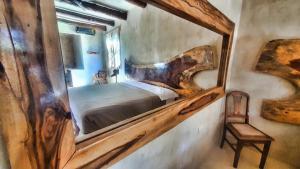 Postel nebo postele na pokoji v ubytování La Casa de Mia Holbox