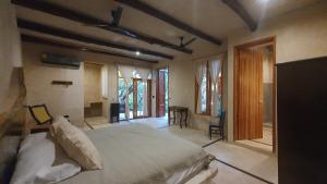Postel nebo postele na pokoji v ubytování La Casa de Mia Holbox + 37 fotografií
