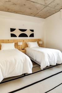 Casagrande Hotel & Beach Club客房内的一张或多张床位