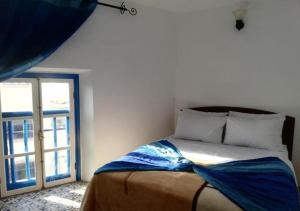 Postel nebo postele na pokoji v ubytování Appart, Hotel & Café Agadir