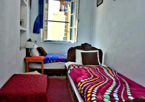 Postel nebo postele na pokoji v ubytování Appart, Hotel & Café Agadir