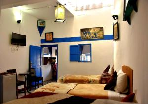 Postel nebo postele na pokoji v ubytování Appart, Hotel & Café Agadir