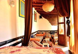 Postel nebo postele na pokoji v ubytování Appart, Hotel & Café Agadir