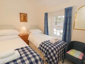 En eller flere senge i et værelse på Llannor