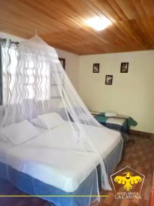 Postel nebo postele na pokoji v ubytování Hotel Minca - La Casona