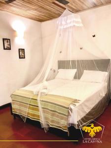 Postel nebo postele na pokoji v ubytování Hotel Minca - La Casona