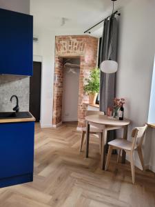 Kuchyňa alebo kuchynka v ubytovaní Cozy Corner Gdansk