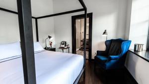 Postel nebo postele na pokoji v ubytování Hotel Giles