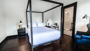 Postel nebo postele na pokoji v ubytování Hotel Giles
