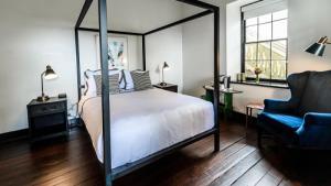 Postel nebo postele na pokoji v ubytování Hotel Giles