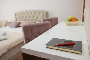 Postel nebo postele na pokoji v ubytování Apartman Pegasus