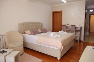 Postel nebo postele na pokoji v ubytování Apartman Pegasus