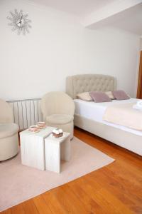 Postel nebo postele na pokoji v ubytování Apartman Pegasus