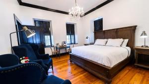 Postel nebo postele na pokoji v ubytování Hotel Giles